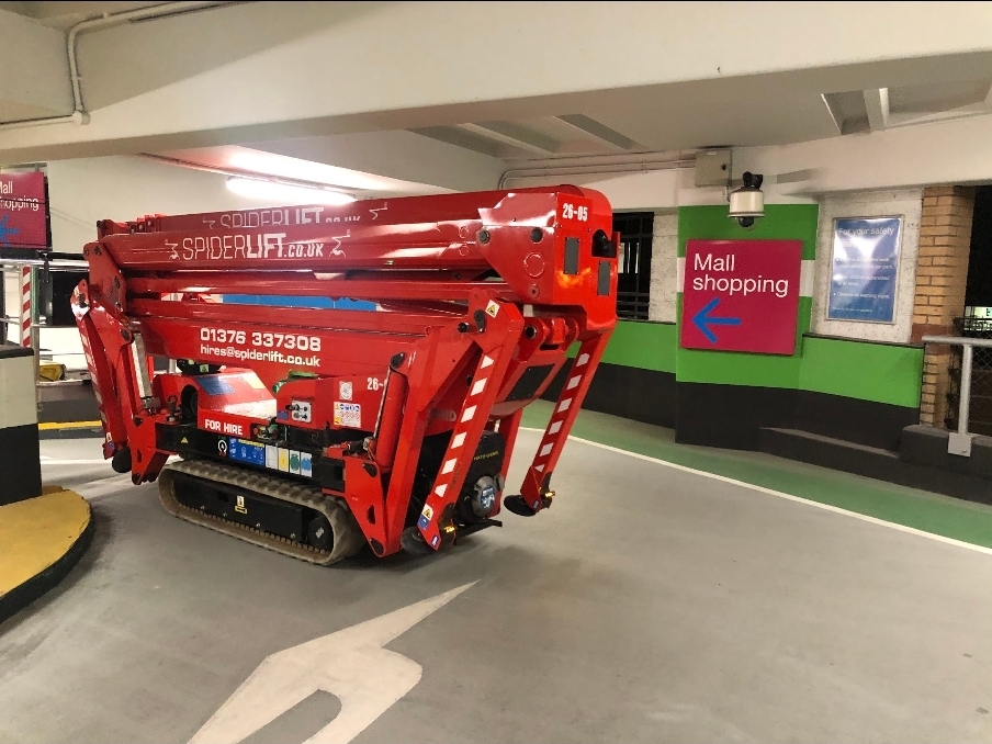 Bluelift SA26 spider lift positioned inside a Barnsley shopping centre for evening work